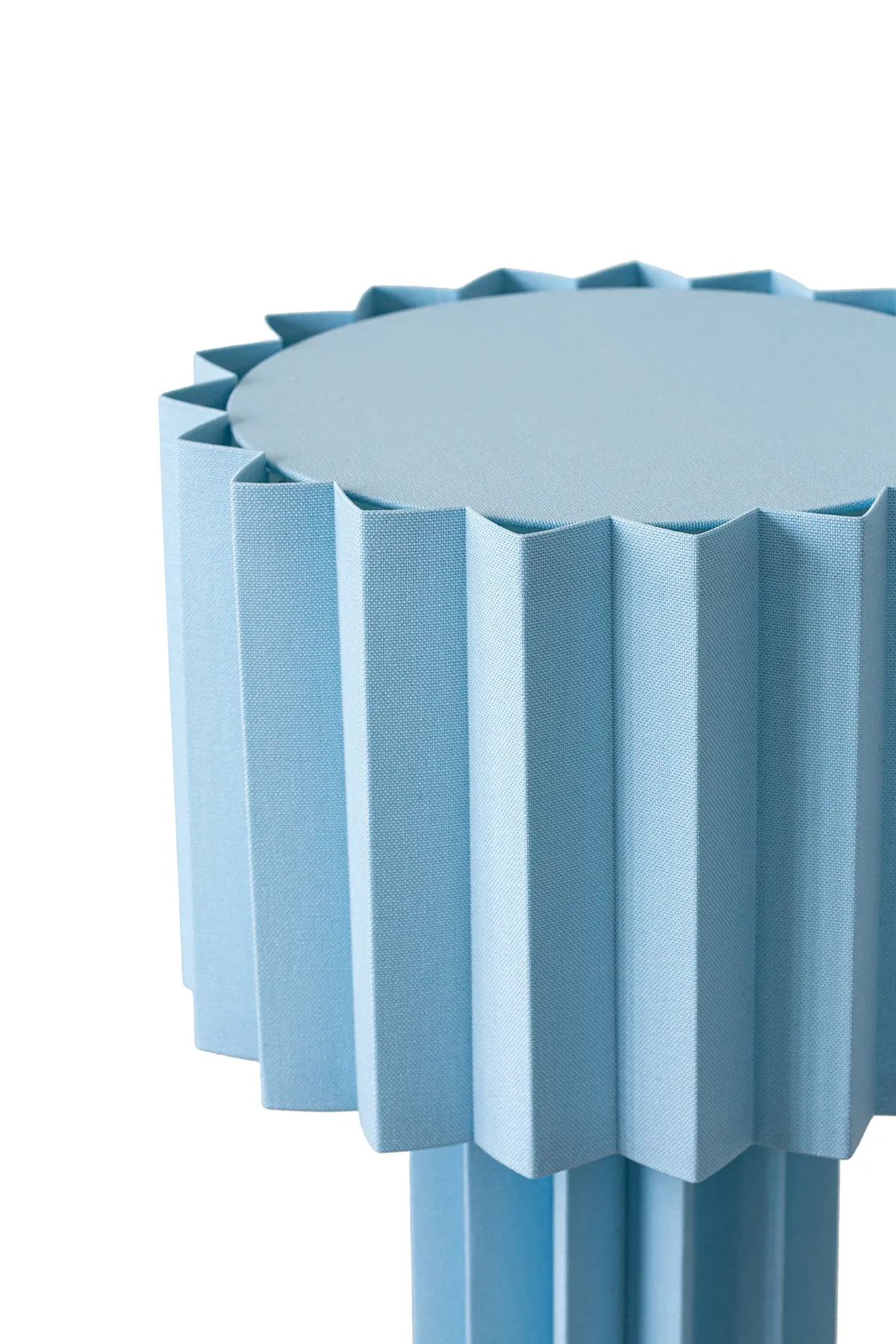 Close-up of hand-pleated pale blue textile shade on Folkform's Plissé lamp