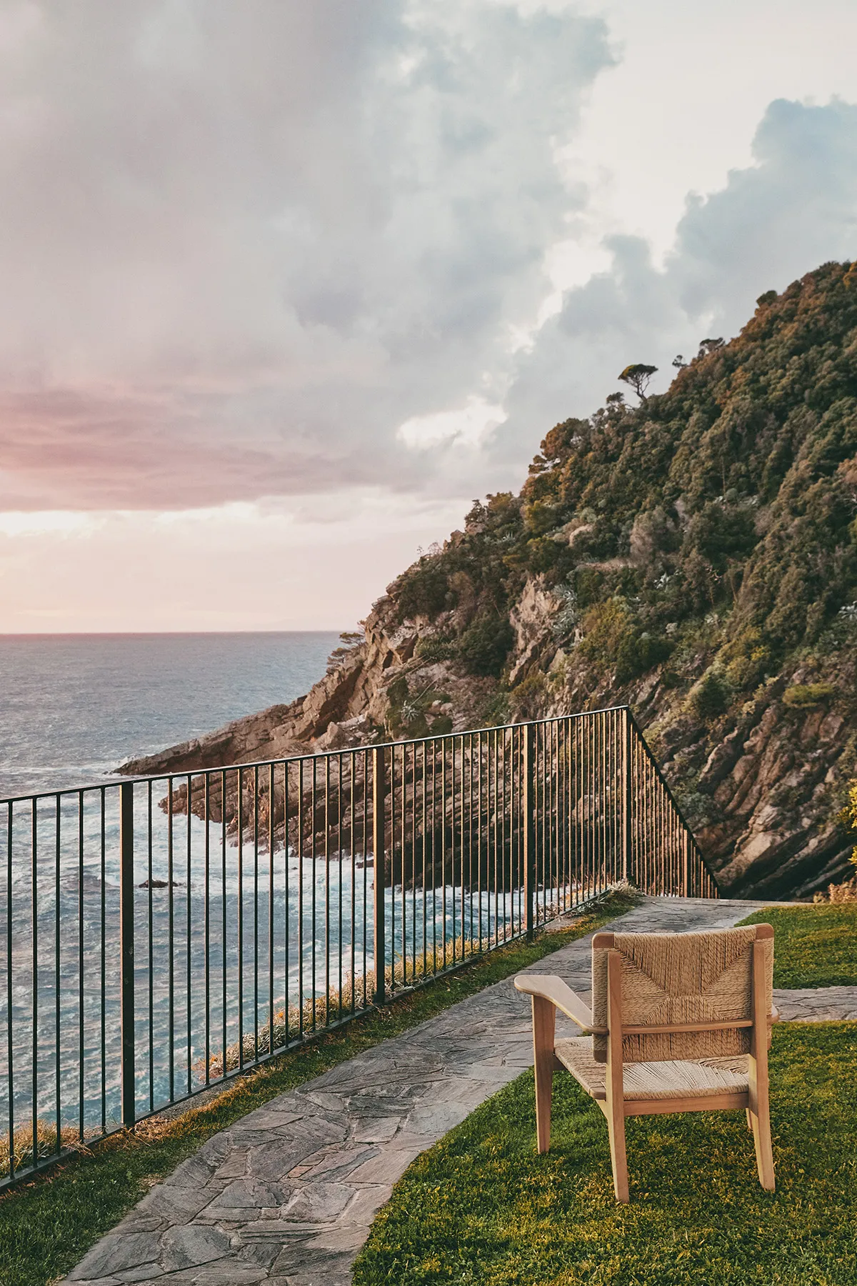 GUBI's revival of Marcel Gascoin's 1949 F-Chair design adapted for outdoor use with durable teak construction