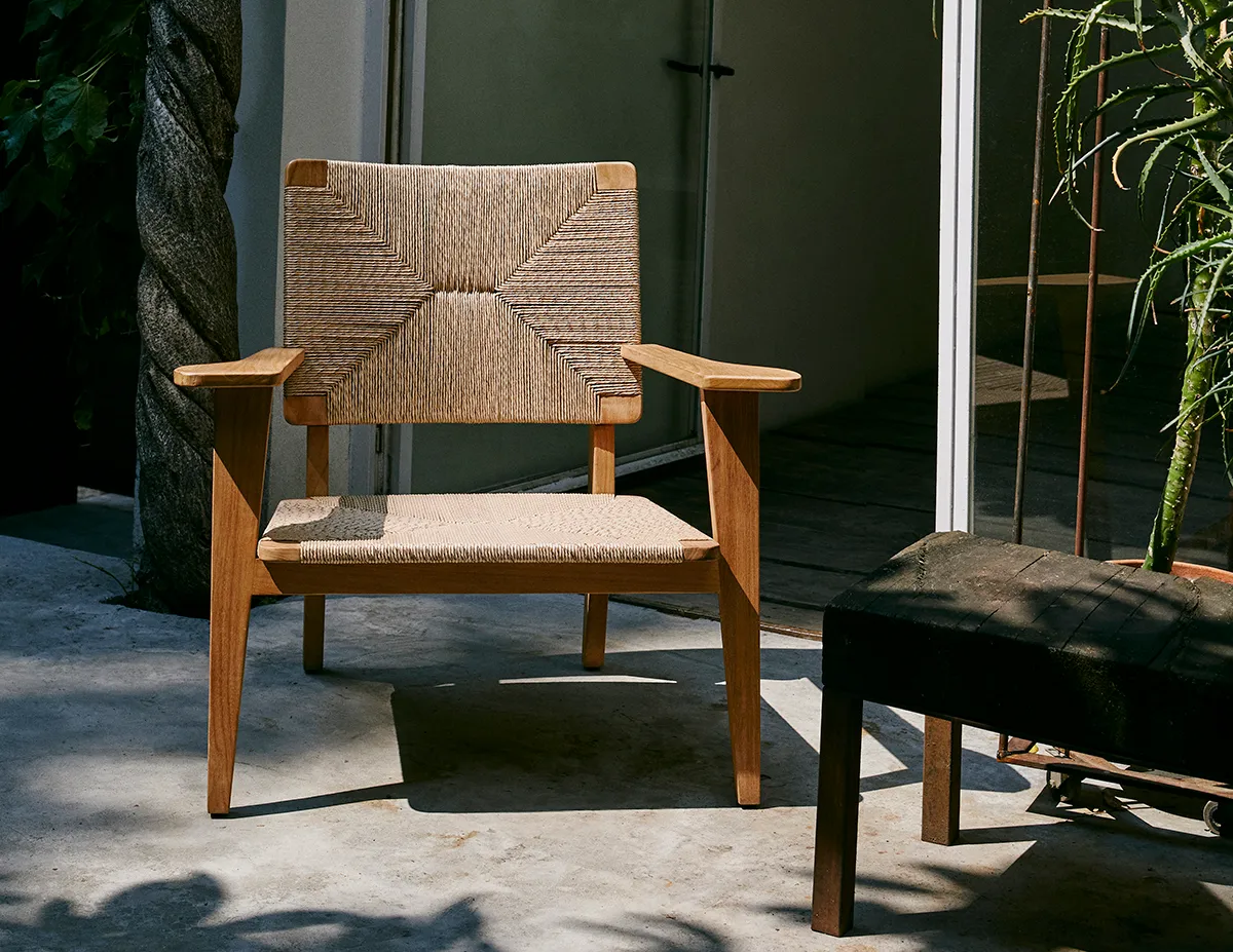 Teak F-Chair Outdoor Lounge Chair showing patina development that enhances the wood's natural beauty