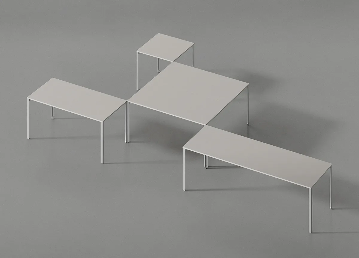 Multiple configurations of Grid Table collection showcasing the system's versatility for various spatial requirements