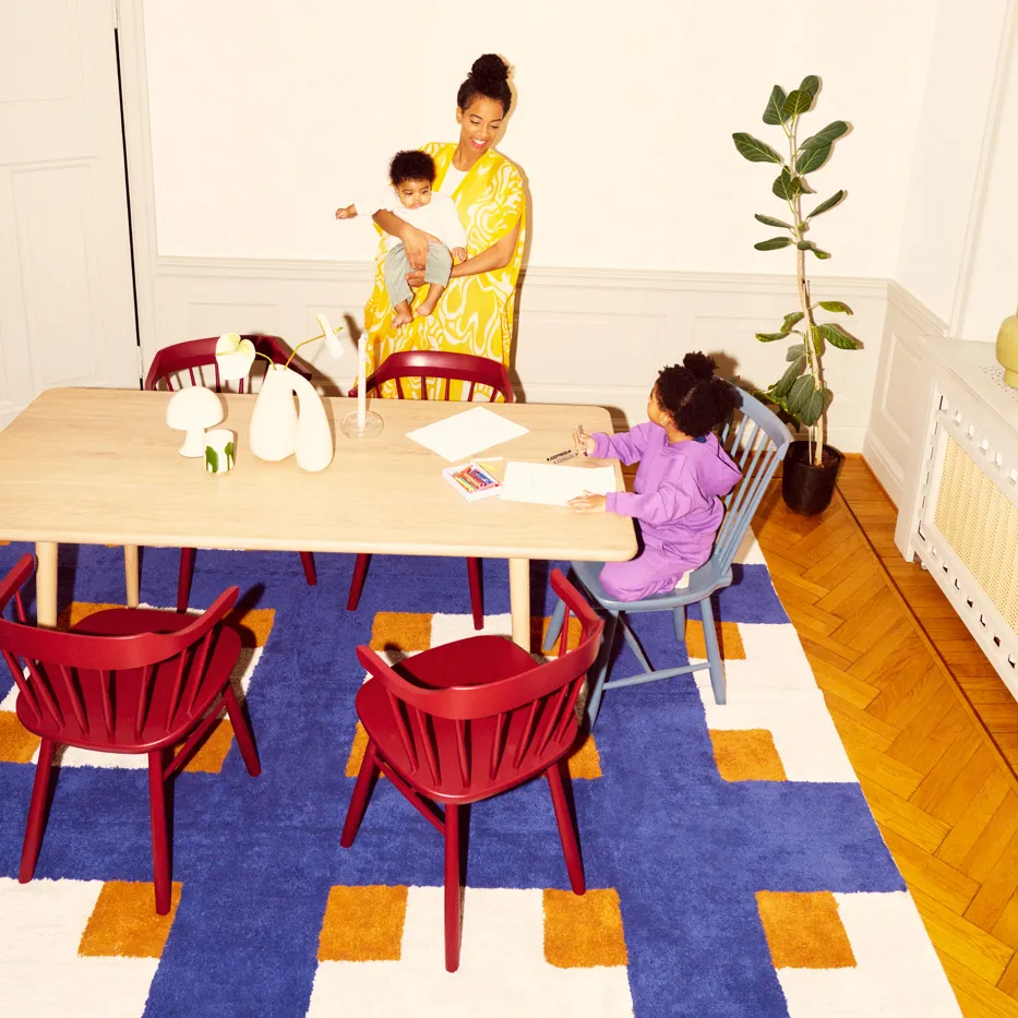 Collection of Småland Bistro chairs and sofas in various finishes showing the versatility of Yngve Ekström's reintroduced bistro furniture line