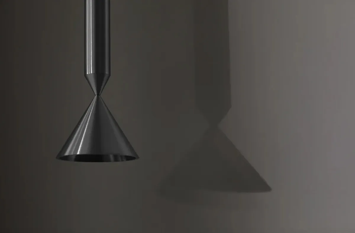 Apollo pendant lamp by PHOLC showing the distinctive end-on-end conical shapes in brushed aluminum finish.