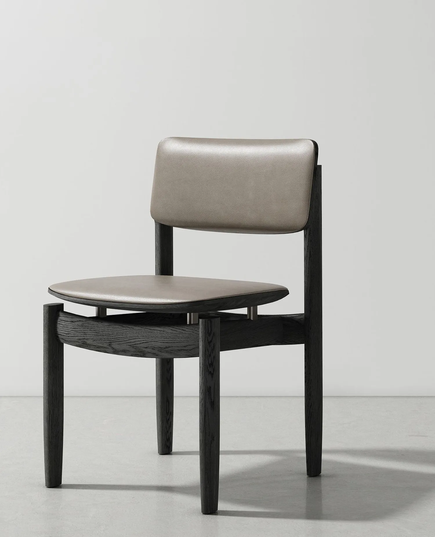 District Eight's Bow Chair highlighting the gravity-defying construction and ergonomic contours.
