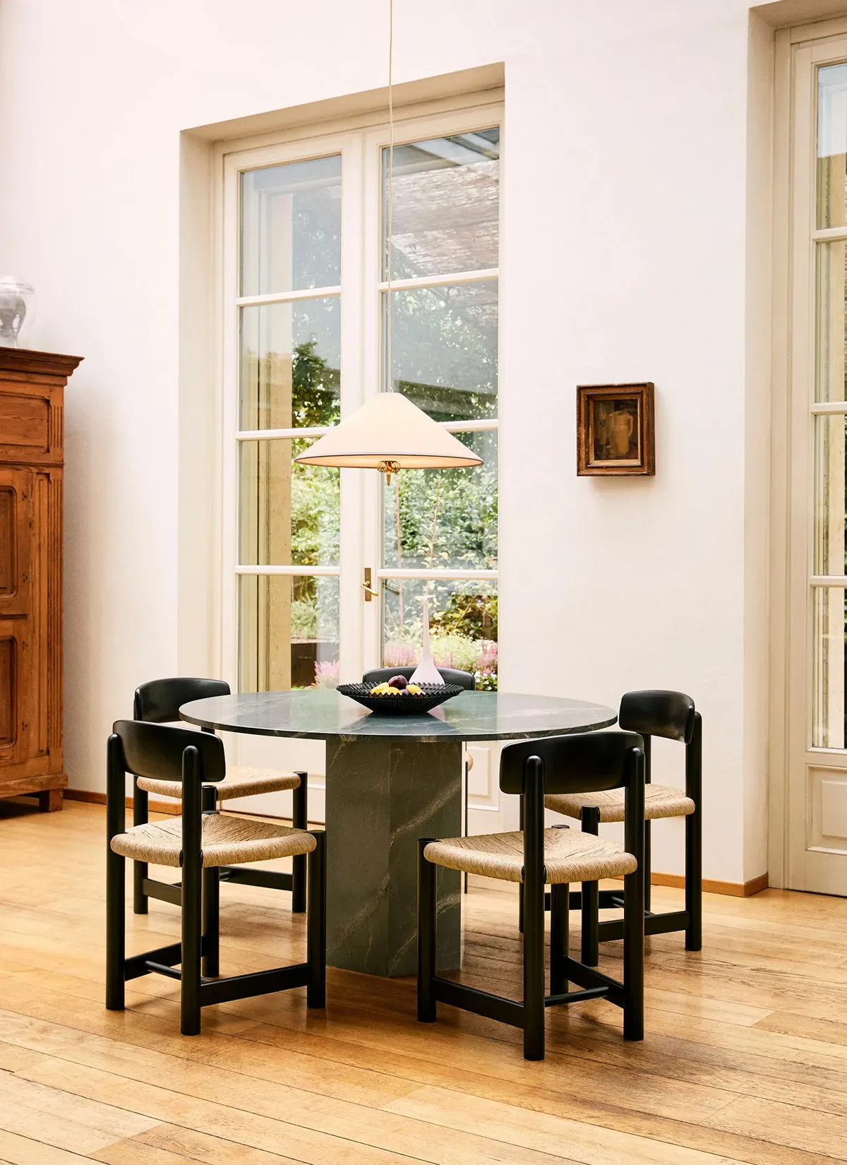 Daumiller Side Chairs in farmhouse dining setting, showcasing their versatility and country-inspired aesthetic.