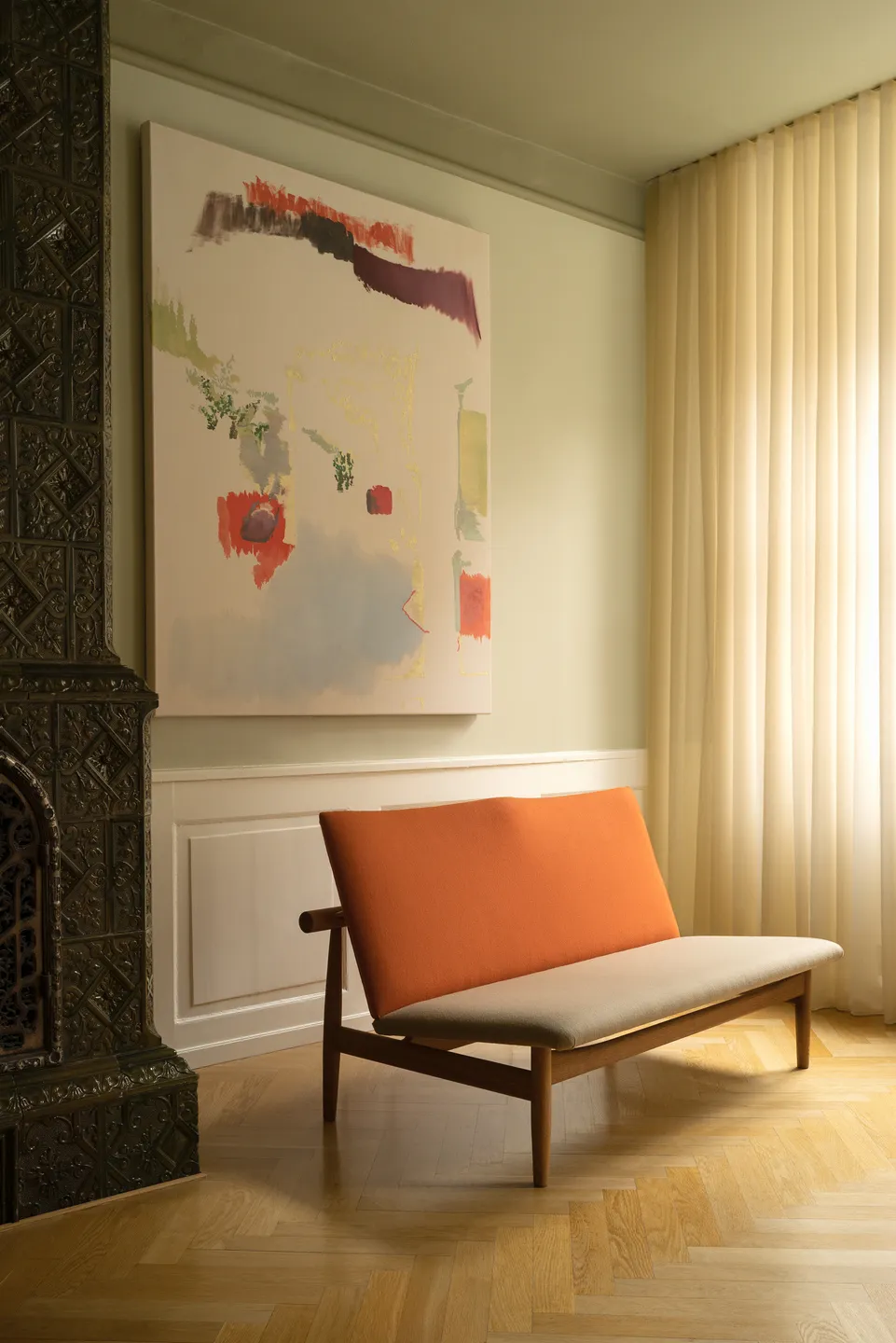 Japan Sofa displaying the characteristic floating backrest and tapered legs inspired by Japanese temple architecture.