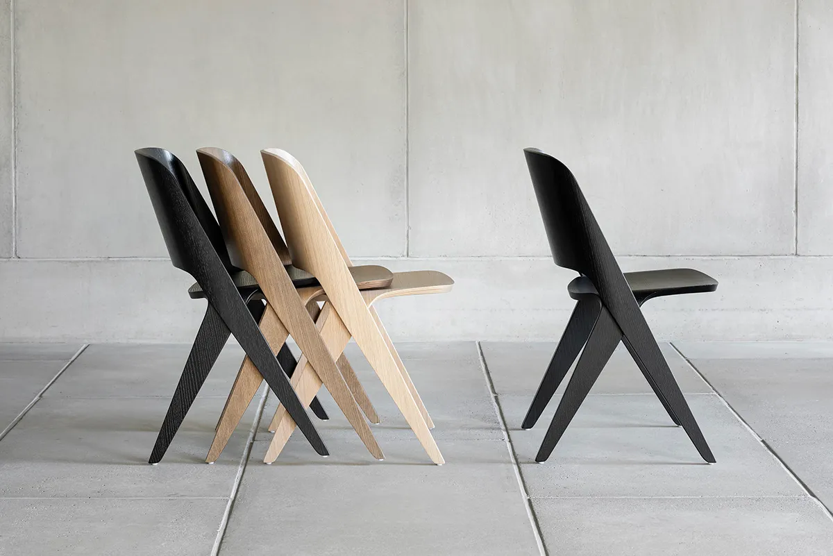 Lavitta chairs in multiple wood finishes showing the collection's versatility and material options