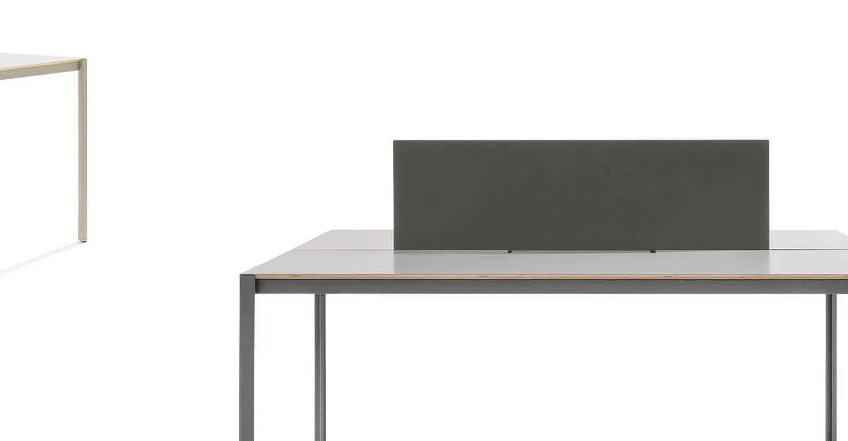 Sarek table with laptop and accessories highlighting its practical design for contemporary workspaces