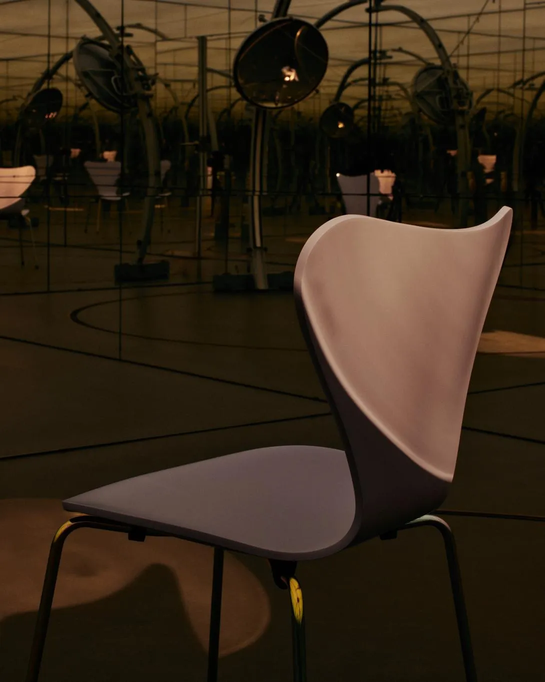 Series 7 chair by Arne Jacobsen for Fritz Hansen in pink with iridescent rainbow base, part of the Morning Light anniversary collection