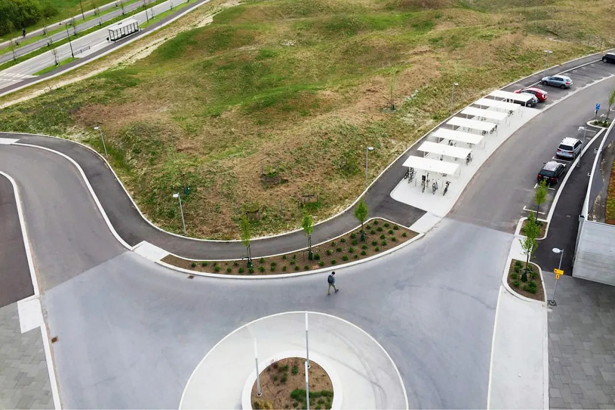 Collection of Våg bike shelters installed at a university campus showing versatility in public space