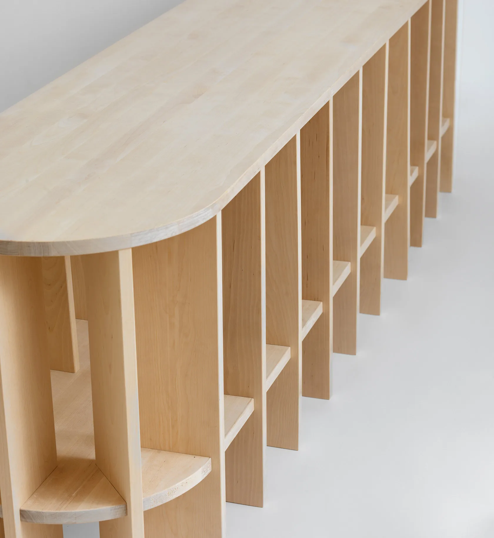 Detailed view of Swedish birch wood grain and linseed oil finish on V.NA.01 shelf system construction