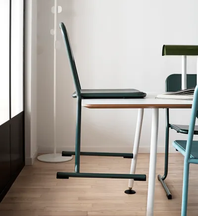 Canard duck chair by Lars Hofsjö for Skandiform showing elegant metal frame with ash seat and stackable design