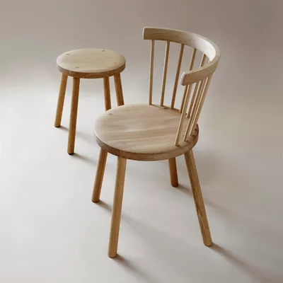 Storia collection including chair and stool variations, demonstrating Nikari's woodworking expertise