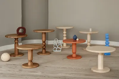 TURN table by White for Blå Station designed for in-between spaces with versatile functionality and compact footprint.