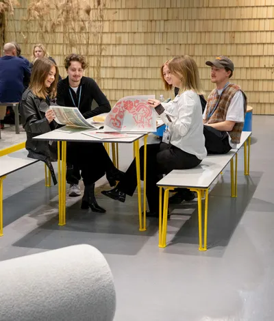 Nola Gard table and bench collection featuring wire frame construction and laminate surfaces by Odin Brange Sollie