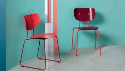 Distinctive Plus Chair by Alexander Lervik for Johanson featuring signature plus sign detail on backrest