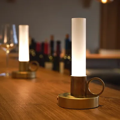 Ambience table lamp by Pierre Sindre for Örsjö featuring sibling relationship to popular Visir design