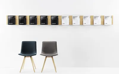 INFO magazine rack by Gunilla Allard for Lammhults featuring brand new material options that refresh the classic design