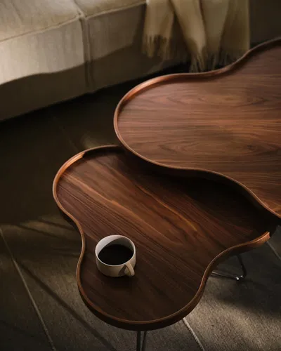 Flower table in walnut by Christine Schwarzer for Swedese, organic silhouette with stem-like legs