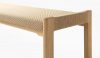 Detail view of Detalji bench's traditional joinery and Woodpecker paper yarn fabric by Ritva Puotila
