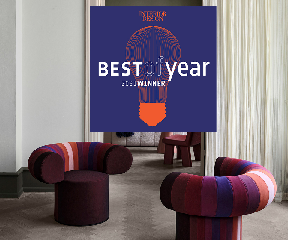 Big Talk modular lounge chair by Adam Goodrum featuring colorful striped upholstery and curved design