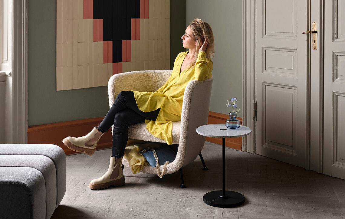 Pocket chair with secret storage compartment creating privacy island by Stone Designs for Blå Station