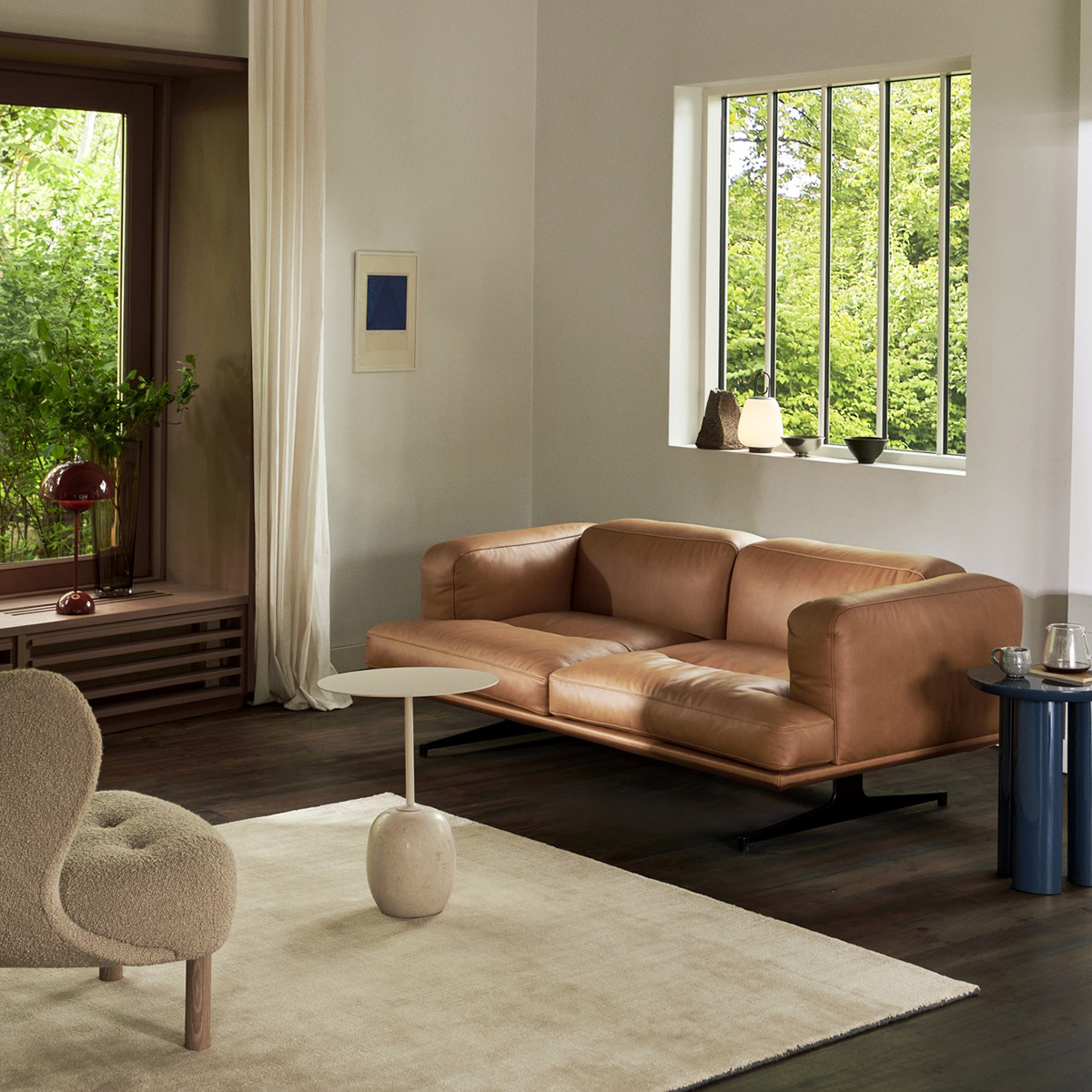 Anderssen Voll Inland sofa overview &Tradition showing low-form deep seating steel base floating design architectural frame