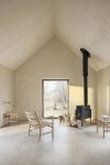 CH004 nesting tables by Hans J. Wegner featuring three graduated sizes with tapered legs and organic design details