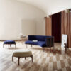 Sideways footstool by Rikke Frost featuring organic oak frame with soft textile upholstery for Carl Hansen