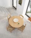 J39 Mogensen 75th Anniversary chair by Fredericia showcasing iconic Danish design with sedge grass seat and oak frame