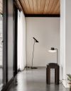 AJ Oxford table lamp by Arne Jacobsen featuring sleek stem and sculptural opal glass shade for Louis Poulsen