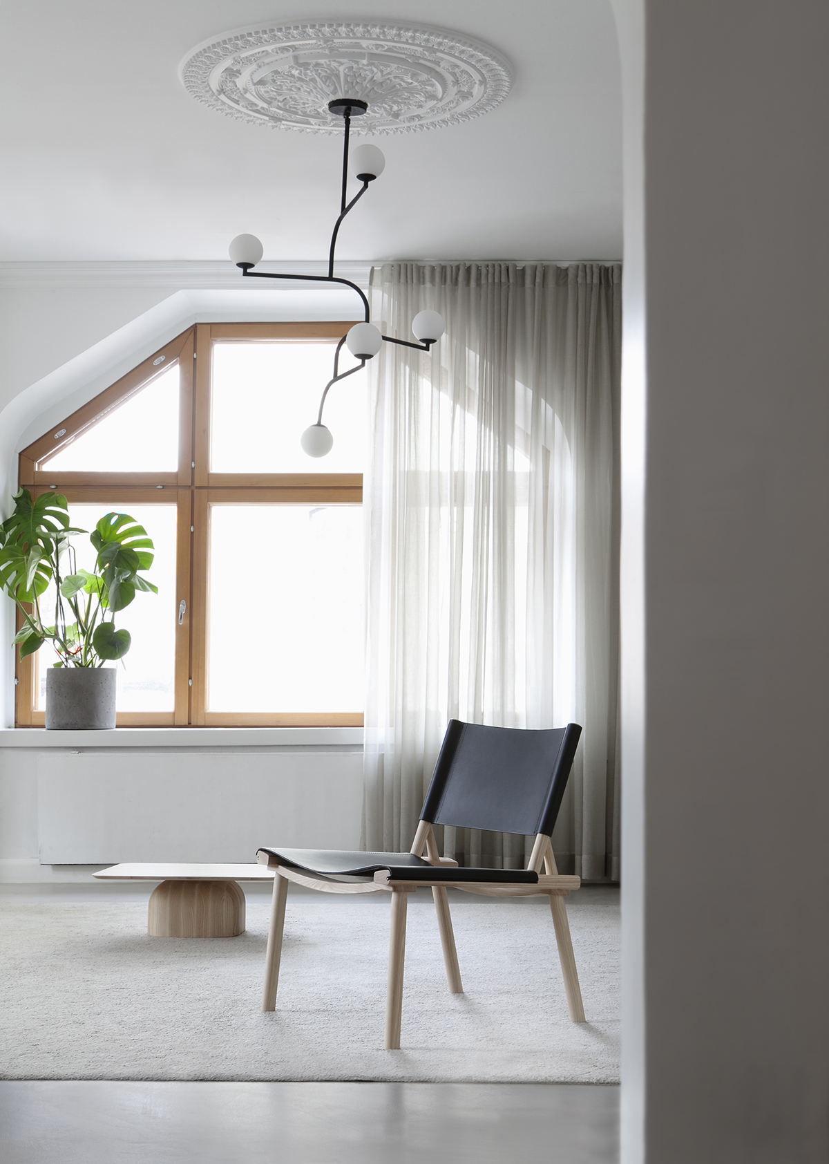 December Lounge Chair by Jasper Morrison and Wataru Kumano for Nikari featuring Nordic minimalist design and oak frame