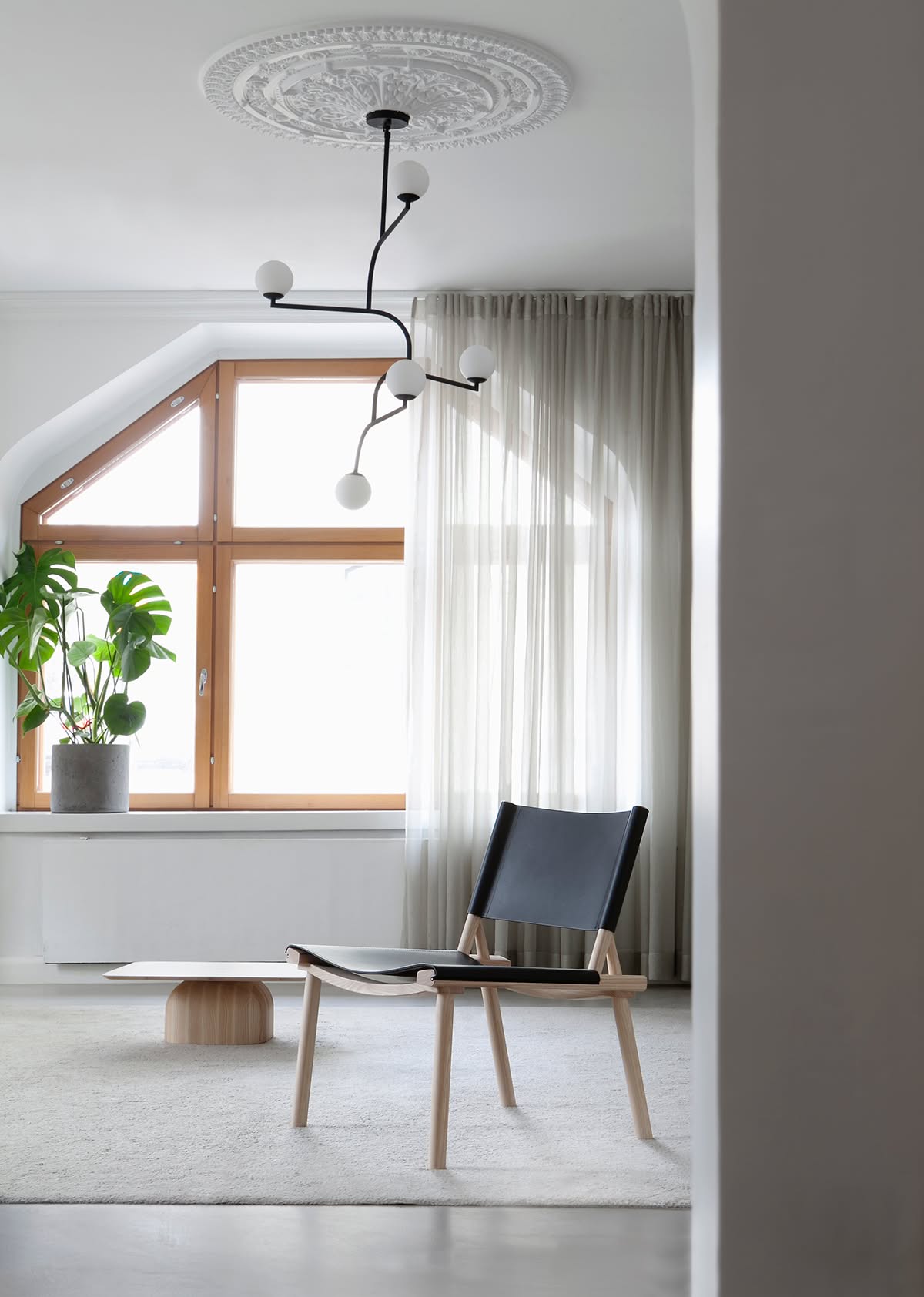 December Lounge Chair by Jasper Morrison and Wataru Kumano for Nikari featuring Nordic minimalist design and oak frame