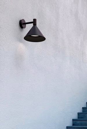 Lumo lighting family overview displaying catenary pendant and wall fixture with matching Nordic design language