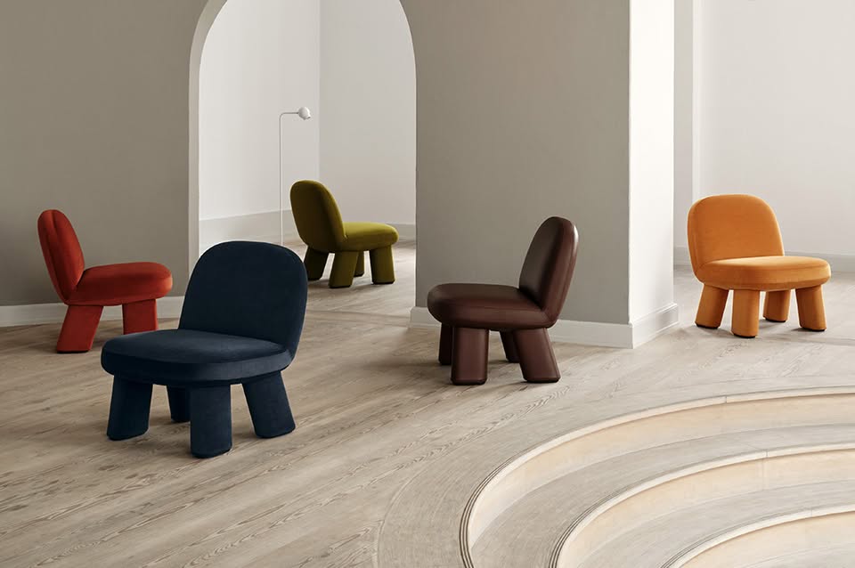 Transformed Maximus easy chair by Johan Ansander for Blå Station, evolving from all-wood construction to springy lushness.