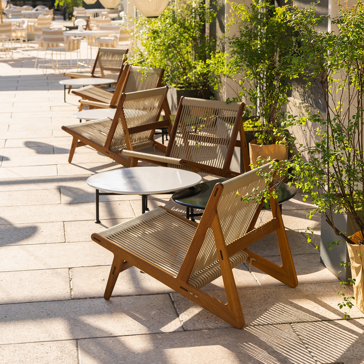 MR01 Initial Outdoor lounge chair featuring weather-resistant materials designed by Mathias Steen Rasmussen for GUBI
