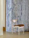Finn Juhl's Reading Chair in ash wood by House of Finn Juhl featuring organic sculptural form