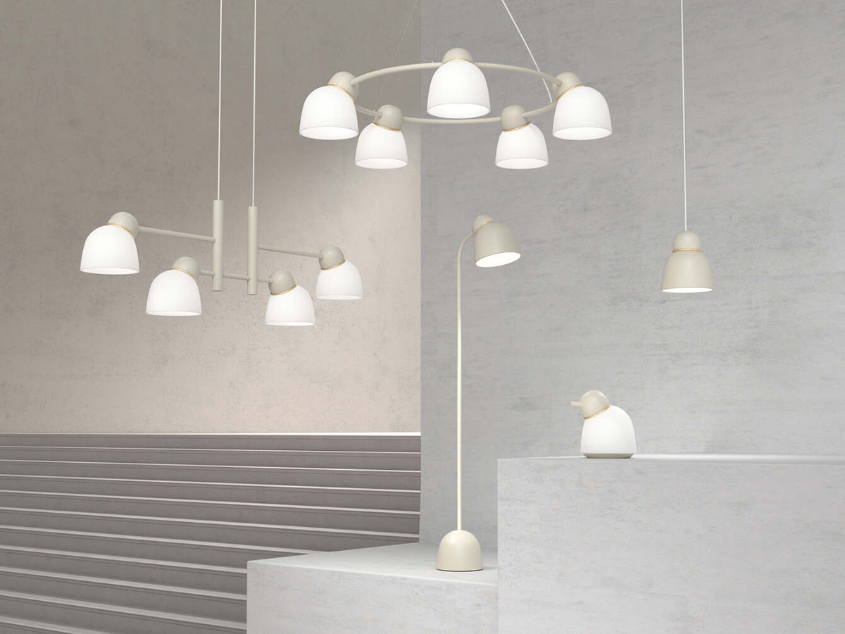 Bird lamp collection by Färg & Blanche for Belid featuring pendant, table, and floor variants in an exhibition setting