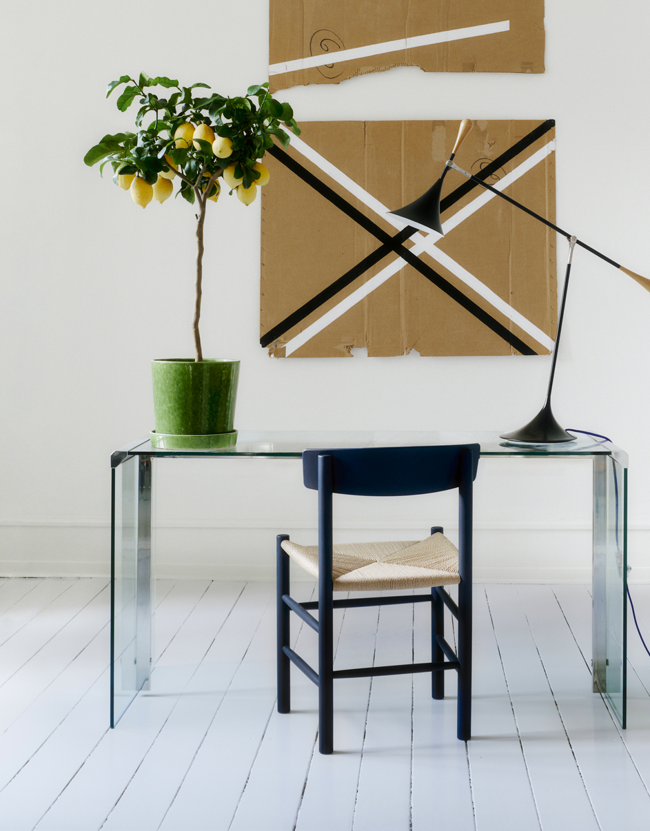 Børge Mogensen's iconic J39 chair by Fredericia displaying new artistic colorways alongside traditional natural finishes