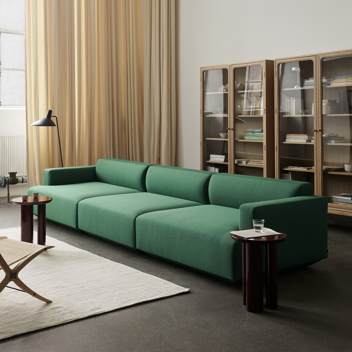 Trace cabinet by Space Copenhagen combining luxurious details with sleek silhouette designed to frame cherished objects.