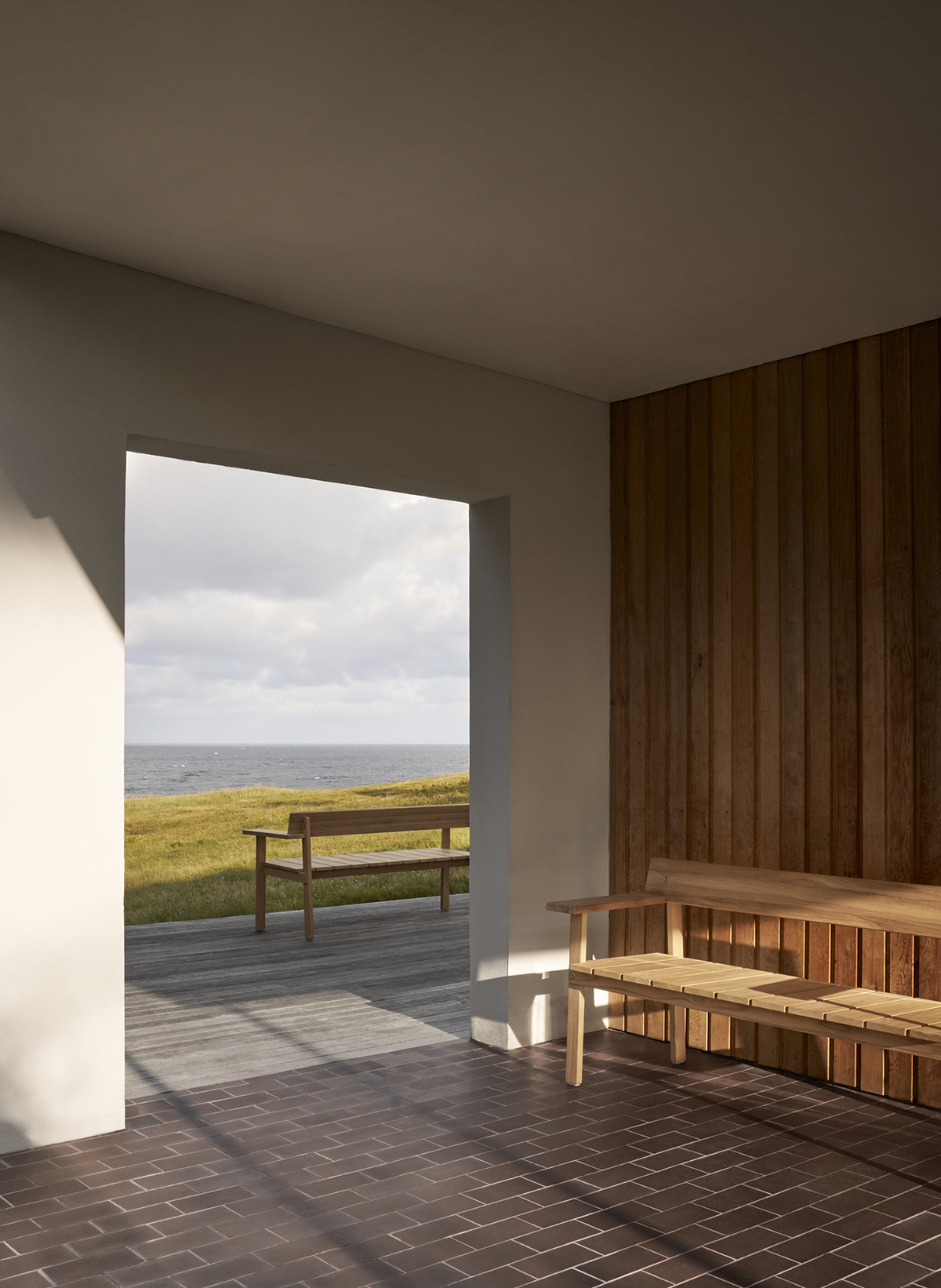 Timbur outdoor bench by Gudmundur Ludvik for Carl Hansen & Søn featuring clean Scandinavian lines with Icelandic design influence
