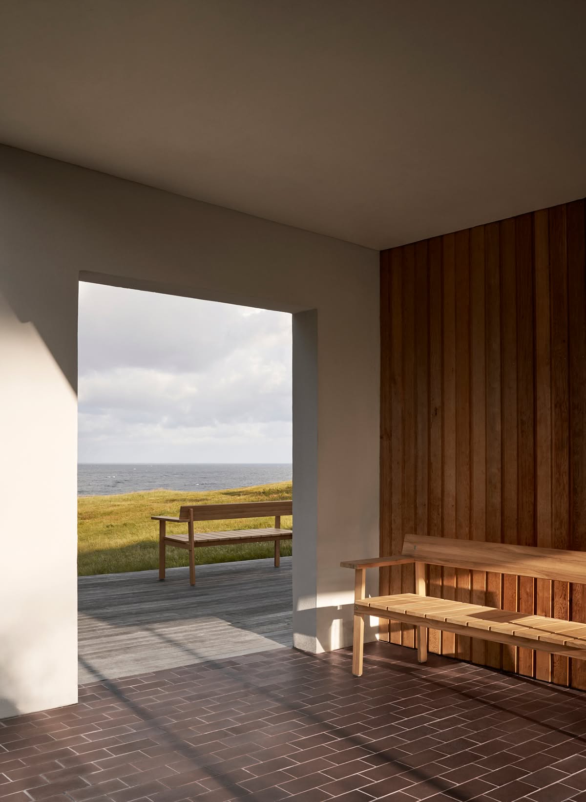 Timbur outdoor bench by Gudmundur Ludvik for Carl Hansen & Søn featuring clean Scandinavian lines with Icelandic design influence