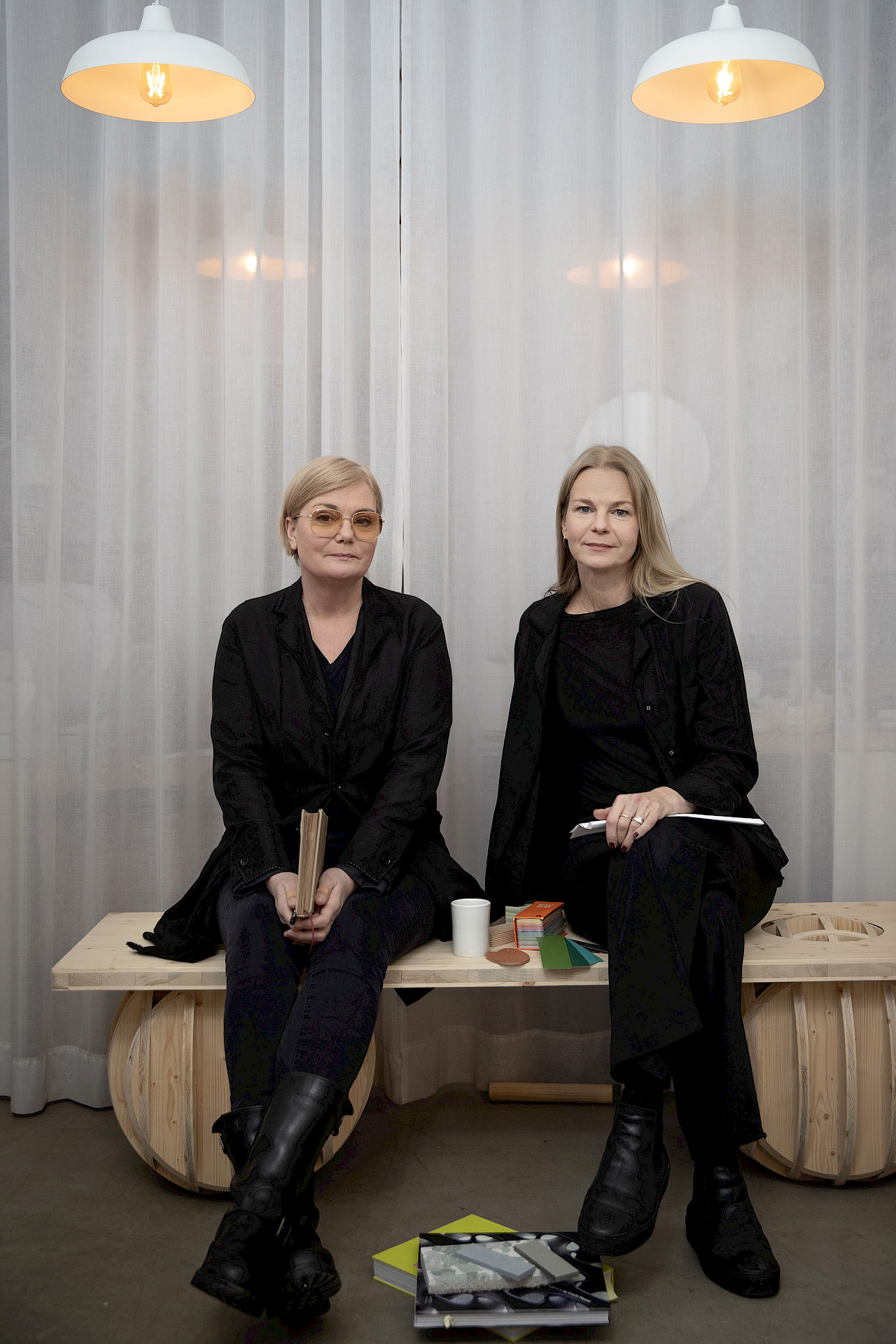 Nola's spatial exhibition stand at Stockholm Furniture Fair creating zones for relaxation and reflection amid trade show activity