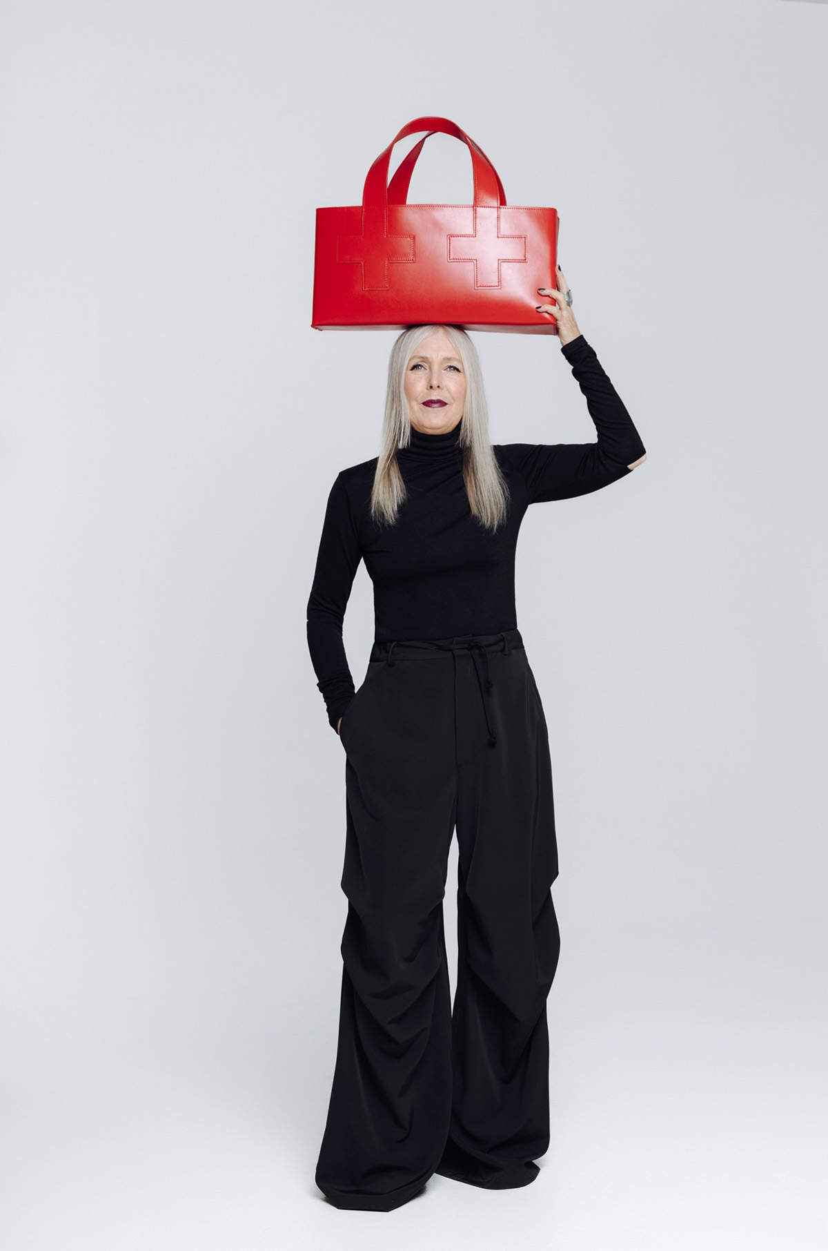 First Aid Bag by Pia Wallén for NK Tärnsjö Garveri collection in vegetable-tanned leather with distinctive cross symbol
