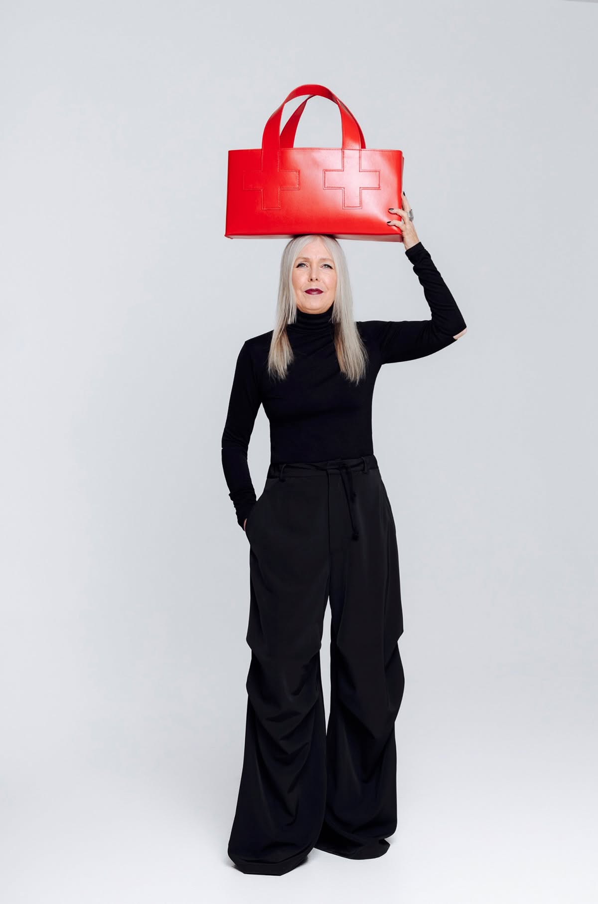 First Aid Bag by Pia Wallén for NK Tärnsjö Garveri collection in vegetable-tanned leather with distinctive cross symbol