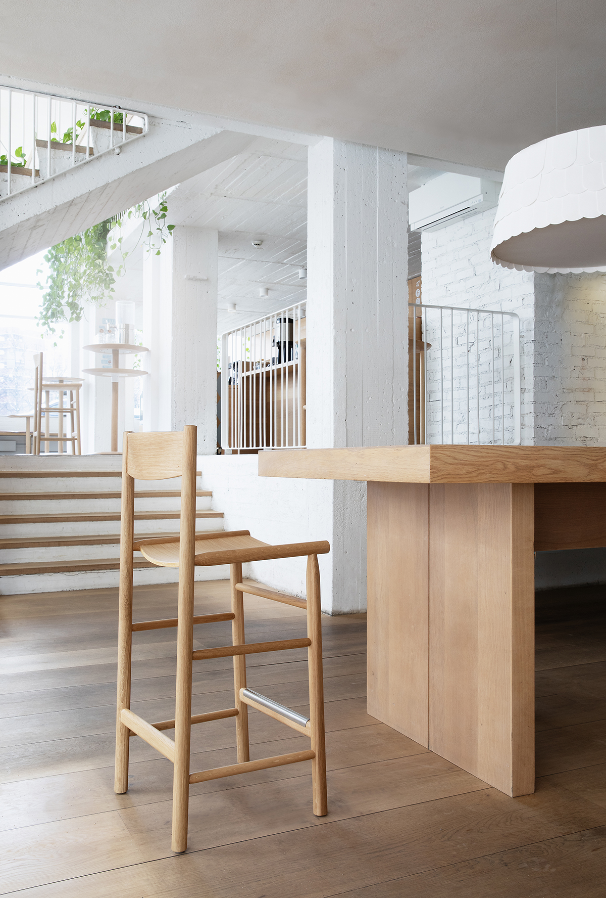 Comfortable Akademia bar chair by design duo Kaksikko for Nikari combining dining chair comfort with bar height