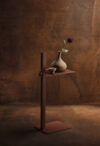 MUSEUM collection by TAF Studio for String expanding with red rust side table that complements the established design family