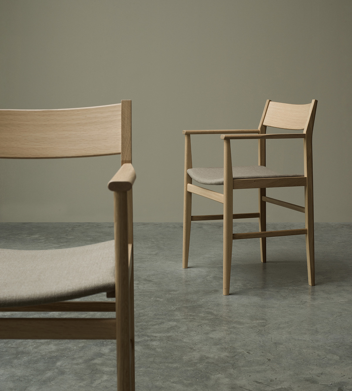 SIZA chair by Pierre Sindre for Mavis featuring architectural lines inspired by Portuguese master Alvaro Siza's distinctive approach