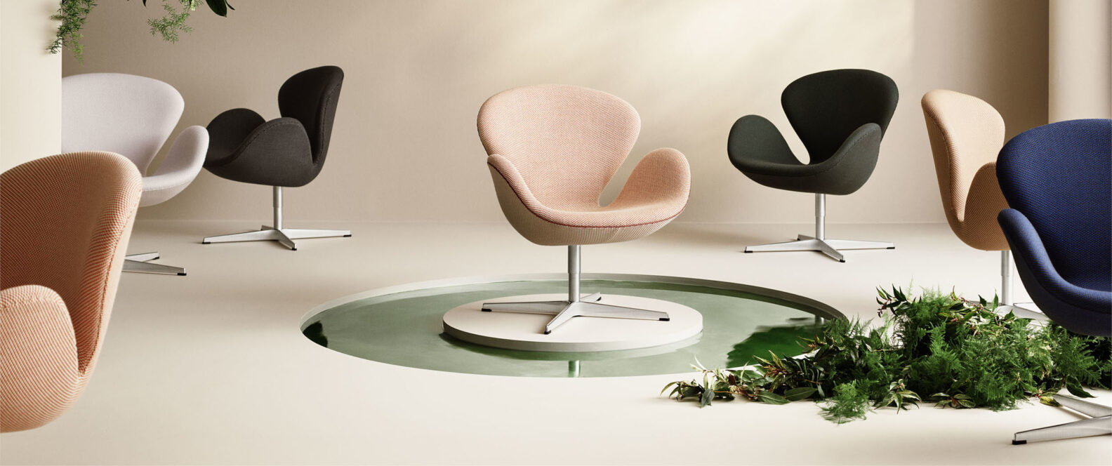 Fritz Hansen iconic furniture collection Scandinavian design Danish craftsmanship Arne Jacobsen Poul Kjaerholm chairs