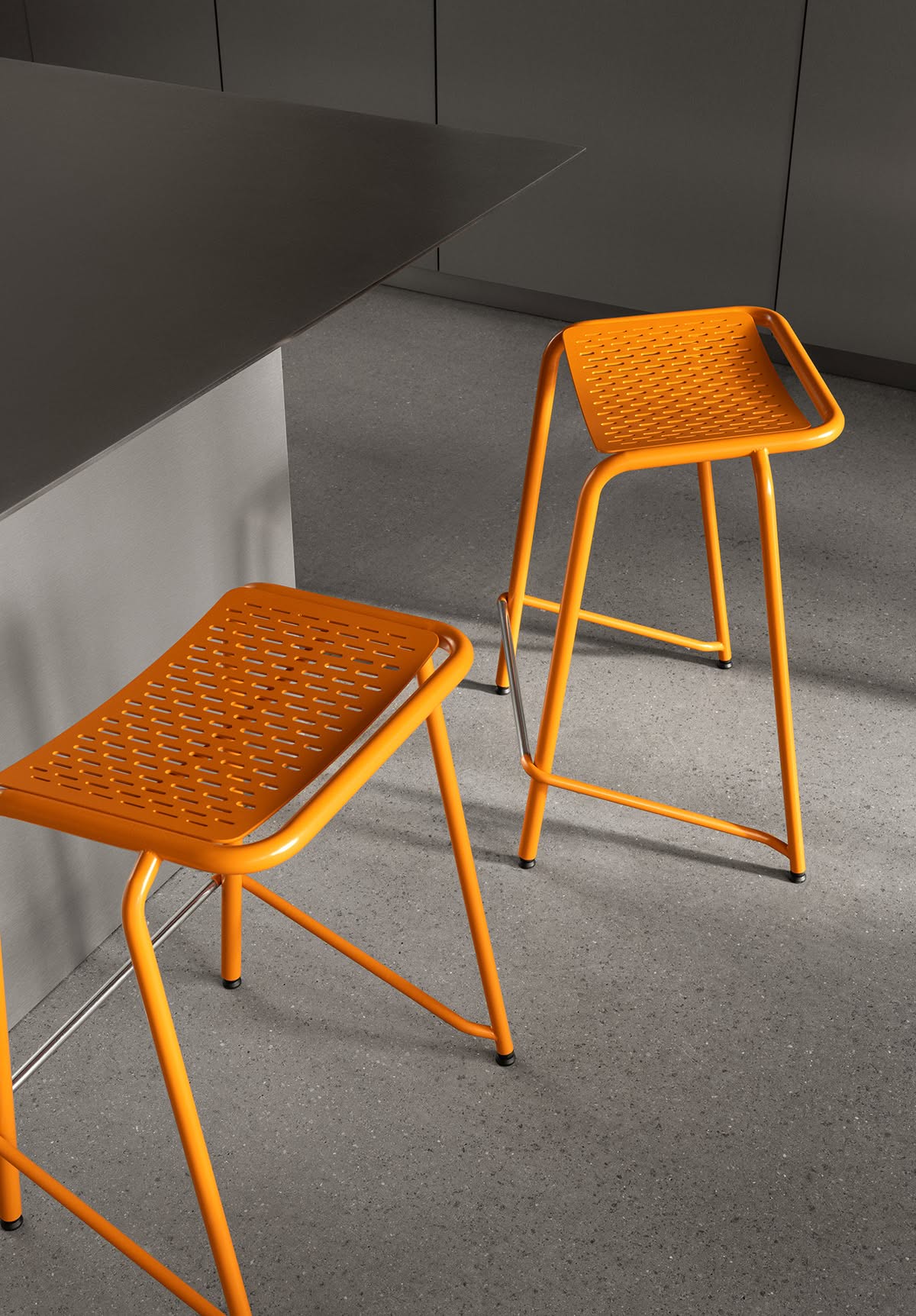 A22 stool by Anya Sebton featuring curved steel tubes in three diameters with laser-cut pattern and graphic character
