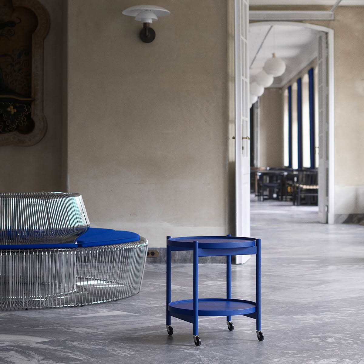The Hans Bølling Tray Table in museum setting, featuring the same blue hue used since 1757 in the historic building